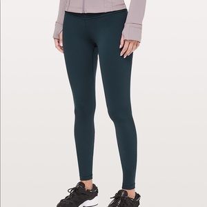 Lululemon wunder under roll down teal size 4